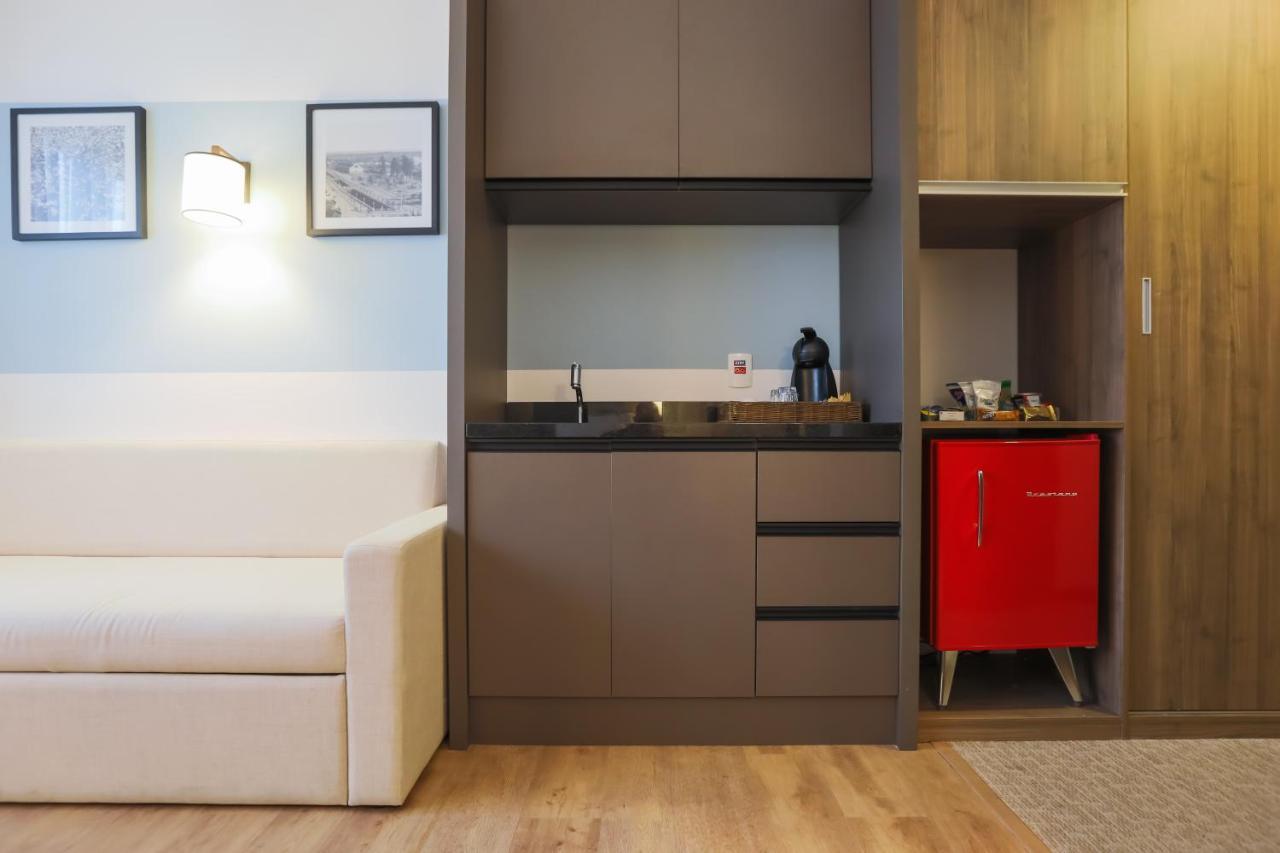 ホテル Tryp By Wyndham リベイラン・プレト エクステリア 写真 A kitchenette in a hotel room